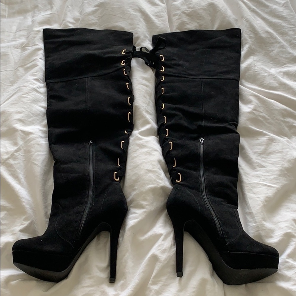 Thigh high black boots